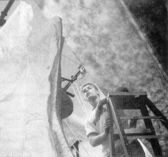 Hard at work hanging the ceiling